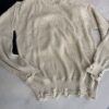 Sweater rasgado