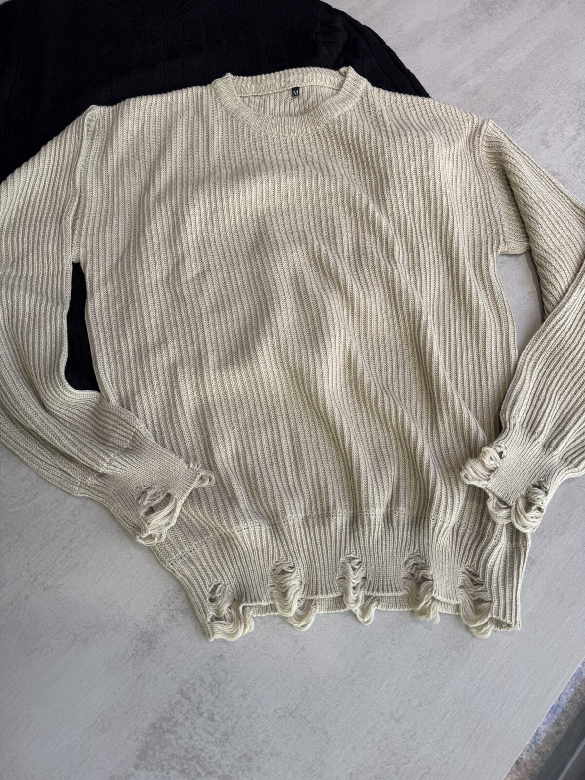 Sweater rasgado