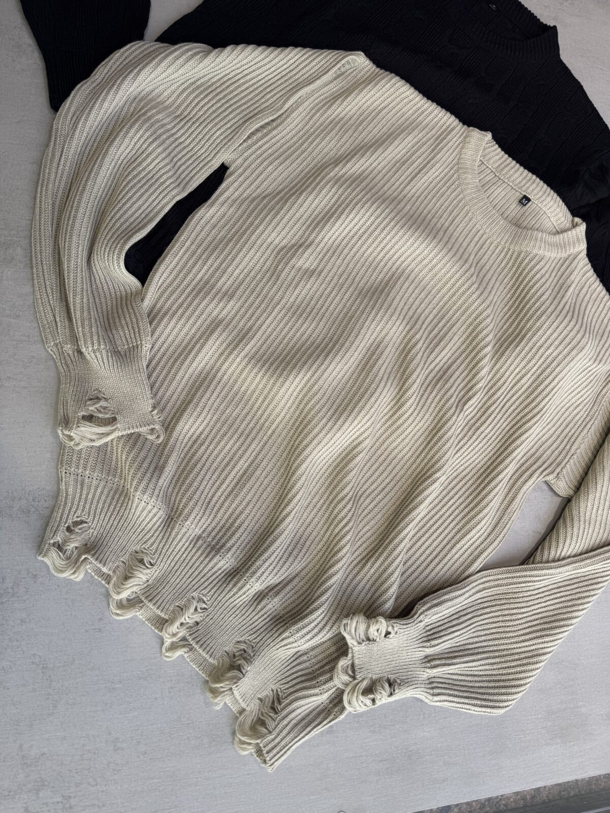 Sweater rasgado