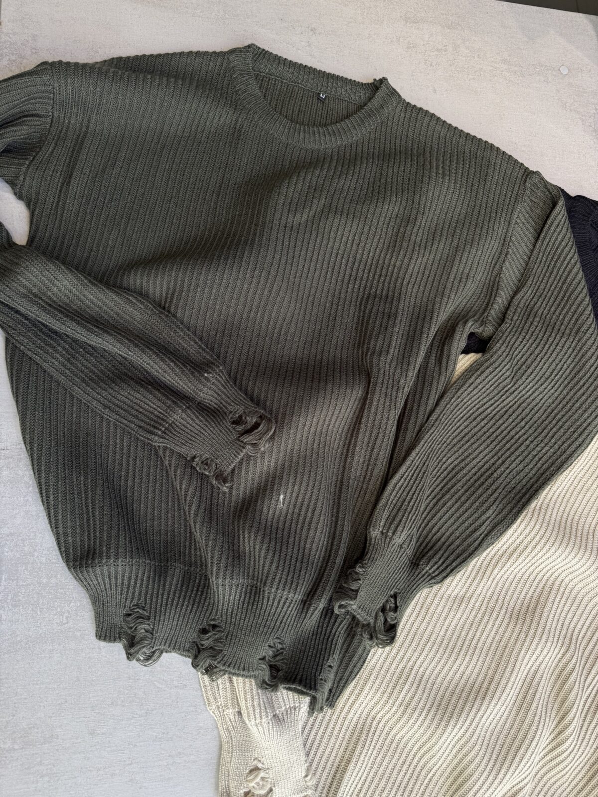 Sweater rasgado
