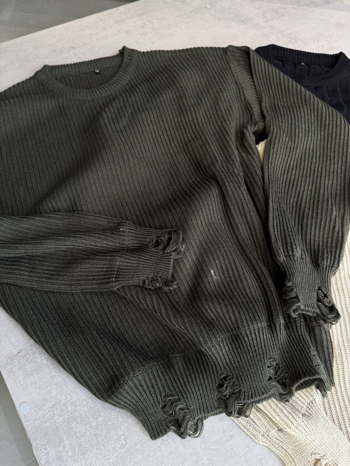 Sweater rasgado